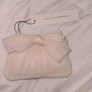 Brand new with tags Loeffler Randall pearl mini bow clutch